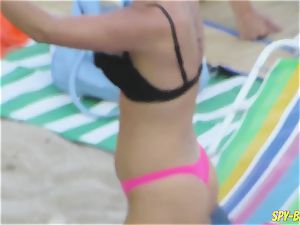 rosy bikini amateur stripped to the waist voyeur Beach dolls